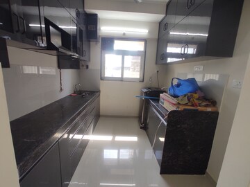 Kitchen in 2 BHK Apartment at Ashar Axis, Majiwada – for Rent