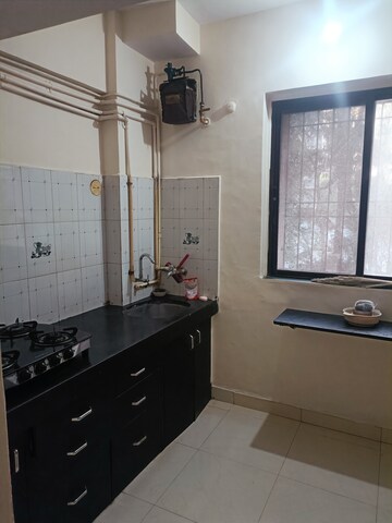 Kitchen in 1 BHK Apartment at Raj Residency Kasarvadavali, Kasarvadavali – for Rent