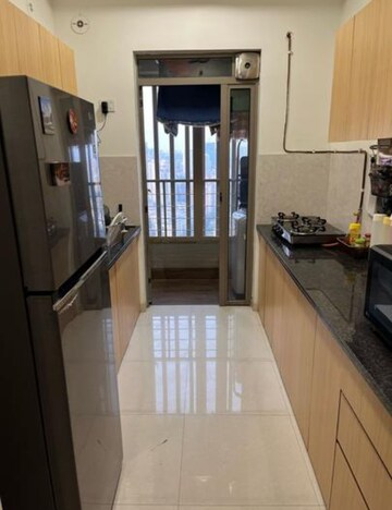 Kitchen in 2 BHK Apartment at Kalpataru Paramount, Kapur Bawdi – for Rent