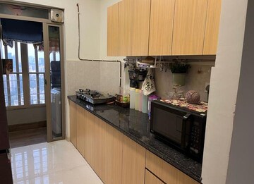 Kitchen in 2 BHK Apartment at Kalpataru Paramount, Kapur Bawdi – for Rent