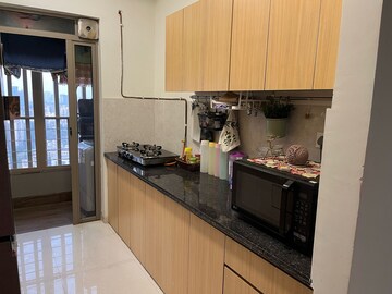 Kitchen in 2 BHK Apartment at Kalpataru Paramount, Kapur Bawdi – for Rent