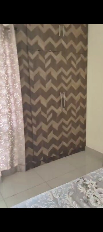 Bedroom in 2 BHK Apartment at Charms Castle, Raj Nagar Extension – for Sale
