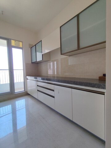 Kitchen in 2 BHK Apartment at Piramal Vaikunth, Balkum Pada – for Rent
