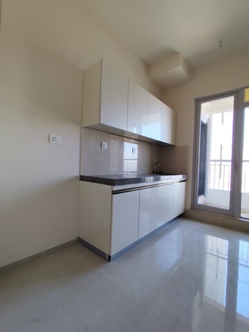 Kitchen in 2 BHK Apartment at Piramal Vaikunth, Balkum Pada – for Rent
