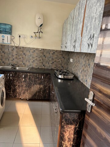 Kitchen in 2 BHK Apartment at Unitech The Residences Sector 33, Sector 33 – for Rent