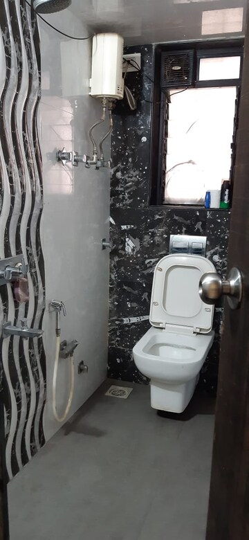 Bathroom in 1 BHK Apartment at Mantri Park, Goregaon East – for Rent