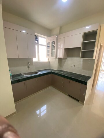 Kitchen in 3 BHK Apartment at ROF Aalayas, Sector 102 – for Rent