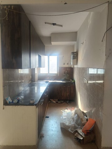 Kitchen in 2 BHK Apartment at Amrapali Silicon City, Sector 76 – for Rent