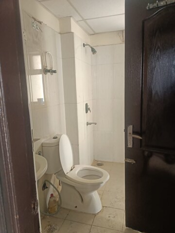 Bathroom in 3 BHK Apartment at Amrapali Silicon City, Sector 76 – for Rent