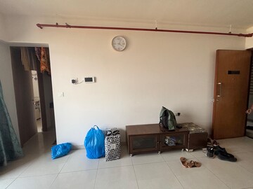 Living Room in 1 BHK Apartment at Godrej Golf Meadows, Poyanje – for Rent