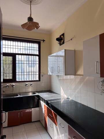 Kitchen in 3 BHK Builder Floor at US Pine Homes, Dhakoli Village – for Rent