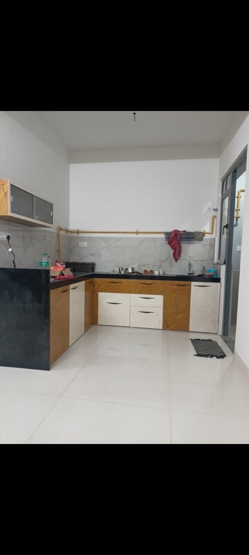 Kitchen in 3 BHK Apartment at Adani Elysium, Near Vaishno Devi Circle On Sg Highway – for Rent