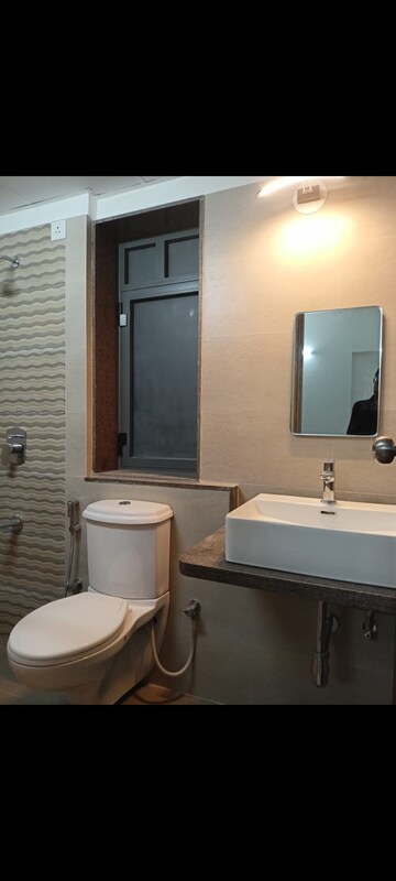Bathroom in 3 BHK Apartment at Adani Elysium, Near Vaishno Devi Circle On Sg Highway – for Rent