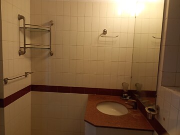Bathroom in 4 BHK Builder Floor at DLF Atria, Dlf Phase ii – for Rent