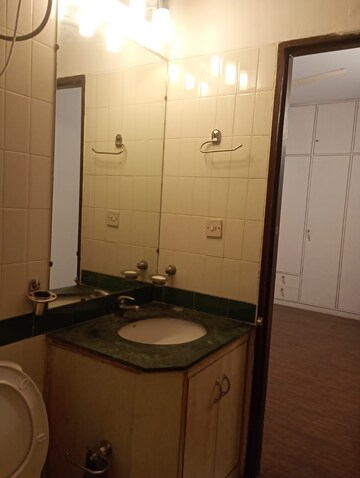 Bathroom in 4 BHK Builder Floor at DLF Atria, Dlf Phase ii – for Rent