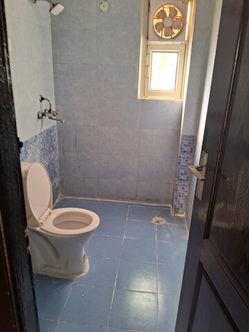 Bathroom in 2.5 BHK Apartment at Aims Golf City, Sector 75 – for Rent