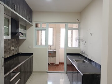 Kitchen in 3.5 BHK Apartment at Pashmina Waterfront, Old Madras Road – for Rent