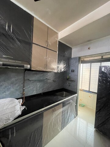 Kitchen in 2.5 BHK Apartment at Awesome Heights, Andheri East – for Rent
