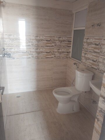 Bathroom in 2.5 BHK Apartment at Amrapali Golf Homes, Sector 4, Greater Noida – for Sale
