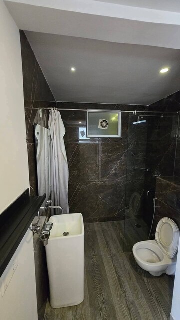 Bathroom in 4 BHK Apartment at Ansal API Versalia, Sector 67a – for Sale