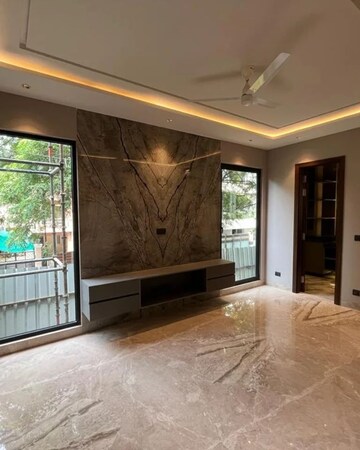 Living Room in 4 BHK Apartment at DLF The Belvedere Park, Sector 24 – for Rent