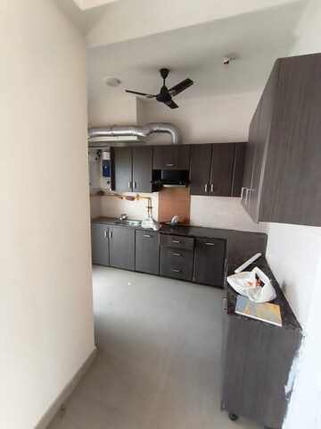 Kitchen in 3 BHK Apartment at Amrapali Princely Estate, Sector 76 – for Rent