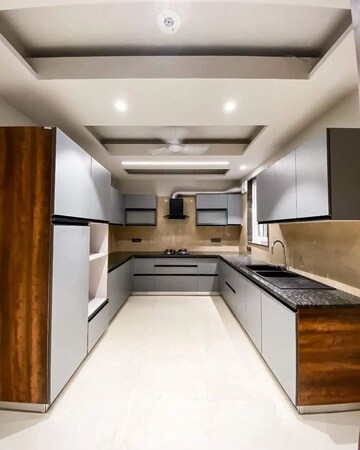 Kitchen in 4 BHK Apartment at DLF Belvedere Towers, Sector 24 – for Rent