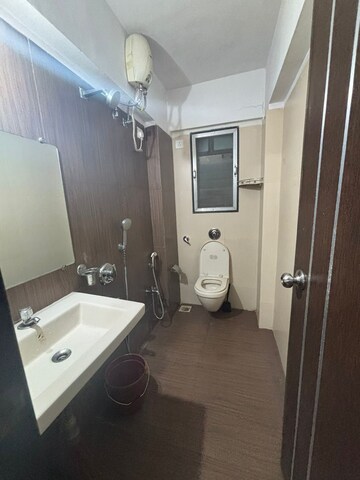 Bathroom in 2 BHK Apartment at Atul Blue Monarch, Andheri East – for Rent