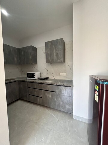 Kitchen in 4 BHK Apartment at DLF The Belvedere Park, Sector 24 – for Sale