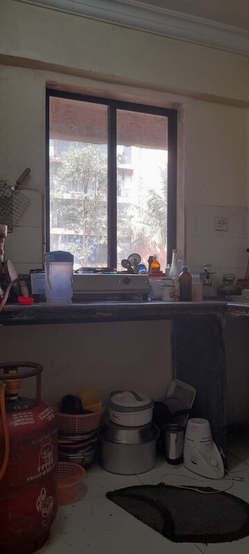 Kitchen in 1 BHK Apartment at DGS Sheetal Tapovan, Malad East – for Sale