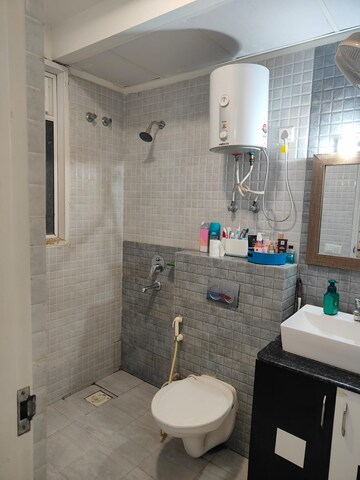 Bathroom in 2 BHK Apartment at Mahagun Mywoods, Sector 16c Greater Noida – for Sale