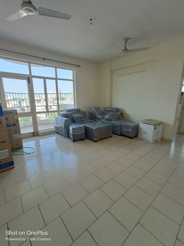Living Room in 2 BHK Apartment at Maple Heights, Sector 43 – for Rent