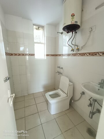 Bathroom in 2 BHK Apartment at Maple Heights, Sector 43 – for Rent