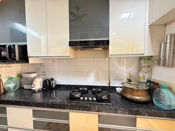 Kitchen in 2 BHK Apartment at Rustomjee Urbania, Majiwada – for Sale