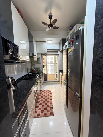 Kitchen in 2 BHK Apartment at Rustomjee Urbania, Majiwada – for Sale