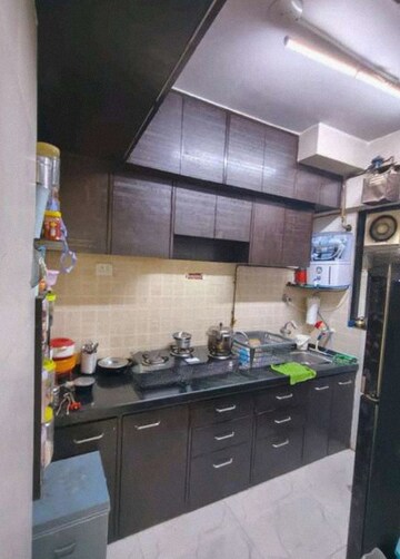 Kitchen in 1 BHK Apartment at Rosa Classique, Kasarvadavali – for Rent