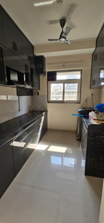 Kitchen in 2 BHK Apartment at Ashar Axis, Majiwada – for Rent