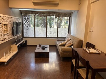 Living Room in 3 BHK Apartment at Rizvi Danda, Carter Road – for Rent