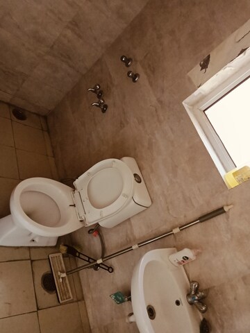 Bathroom in 2 BHK Apartment at Wave Dream Homes, Wave City – for Rent