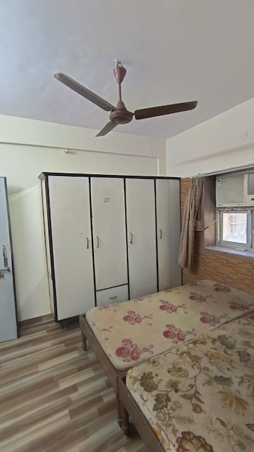 Bedroom in 1 BHK Apartment at Gokuldham Complex, Goregaon East – for Rent