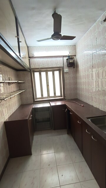 Kitchen in 1 BHK Apartment at Gokuldham Complex, Goregaon East – for Rent