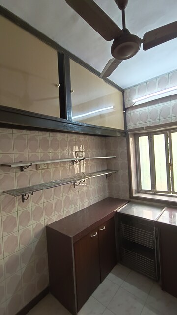 Kitchen in 1 BHK Apartment at Gokuldham Complex, Goregaon East – for Rent