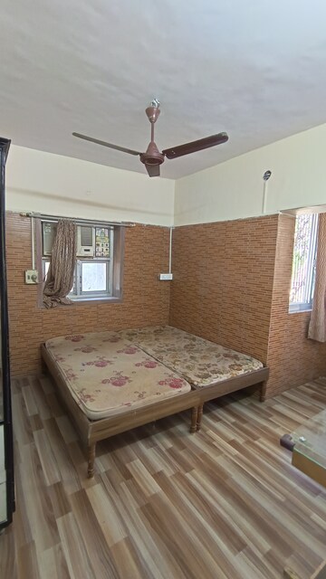 Bedroom in 1 BHK Apartment at Gokuldham Complex, Goregaon East – for Rent