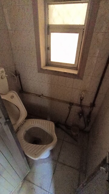 Bathroom in 1 BHK Apartment at Gokuldham Complex, Goregaon East – for Rent