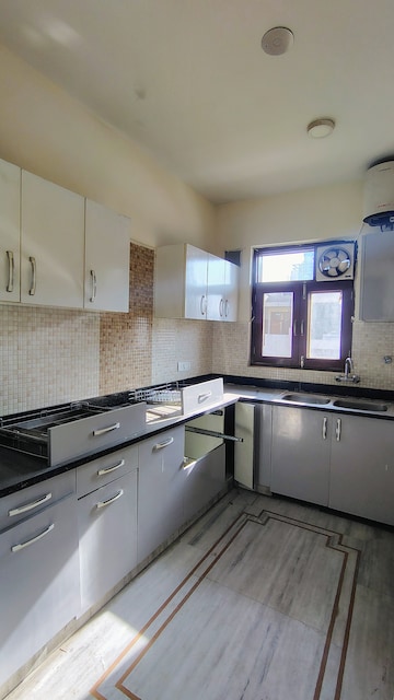 Kitchen in 3.5 BHK Builder Floor at RWA Residential Society Sector 46, Sector 46 – for Rent