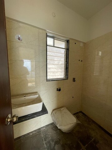 Bathroom in 2 BHK Apartment at RRB Satra Harmony, Chembur – for Rent