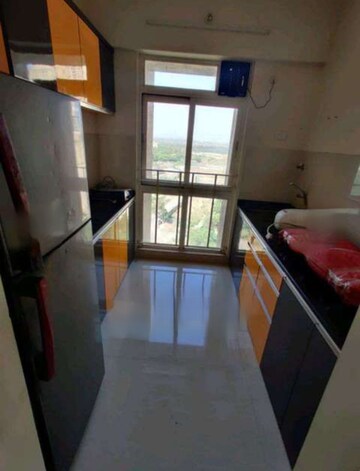 Kitchen in 2 BHK Apartment at Vijay Orovia, Ghodbunder Road – for Rent