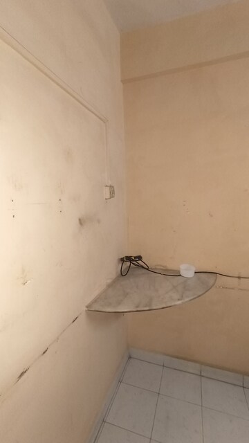 Bathroom in 1 BHK Apartment at Dak Sangathan CHS, Malad East – for Rent