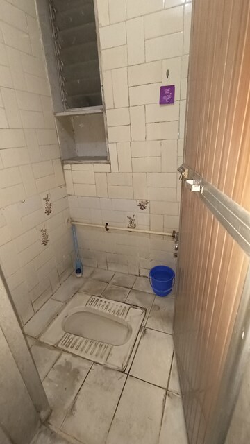 Bathroom in 1 BHK Apartment at Dak Sangathan CHS, Malad East – for Rent