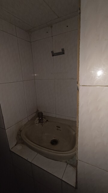 Bathroom in 1 BHK Apartment at Dak Sangathan CHS, Malad East – for Rent